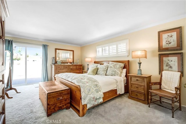 8640 Lindante Dr, Whittier, CA 90603 - bedroom with access to outside, light carpet, and crown molding
