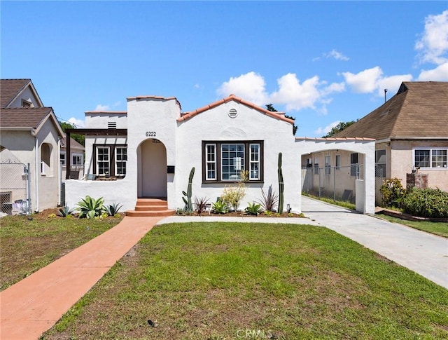 6222 Eileen Ave, Los Angeles, CA 90043 - mediterranean / spanish-style home with stucco siding and driveway