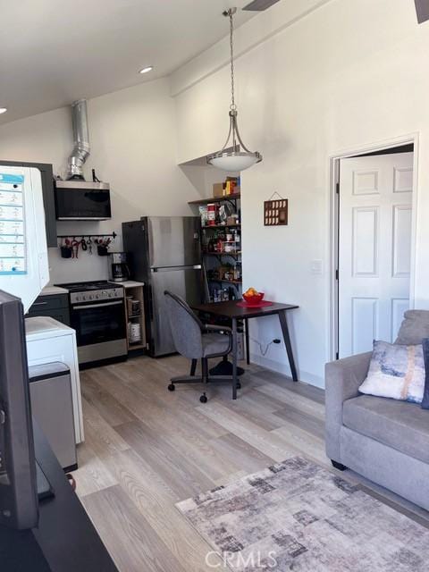 11529 De Celis Pl, Granada Hills, CA 91344 - kitchen with stainless steel appliances, light wood-style floors, washer / clothes dryer, and recessed lighting