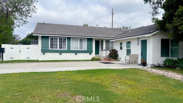 11529 De Celis Pl, Granada Hills, CA 91344 - ranch-style home with a front yard