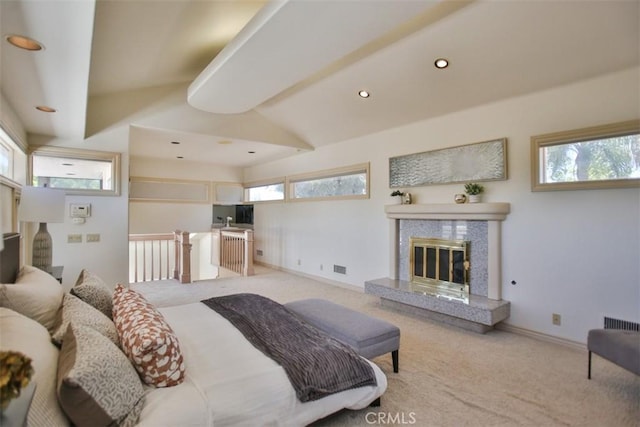 3624 Hollins Ave, Claremont, CA 91711 - bedroom with light colored carpet, a tile fireplace, lofted ceiling, recessed lighting, and baseboards