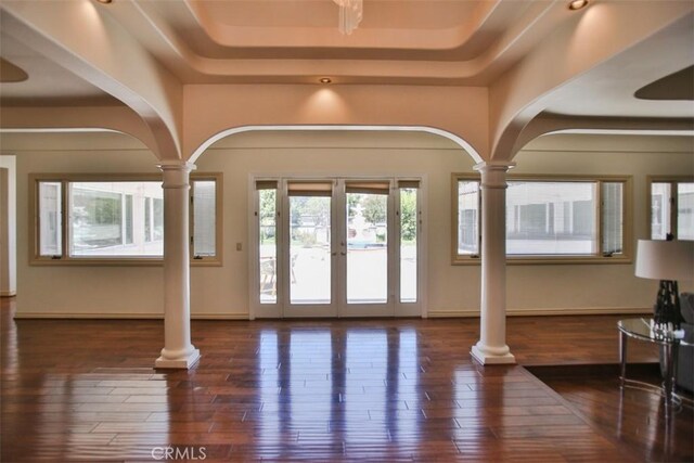 3624 Hollins Ave, Claremont, CA 91711 - entrance foyer with decorative columns, arched walkways, and hardwood / wood-style floors