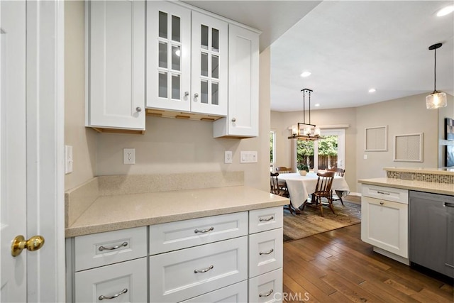 31484 Britton Cir, Temecula, CA 92591 - kitchen with dishwasher, white cabinets, dark wood finished floors, glass insert cabinets, and recessed lighting