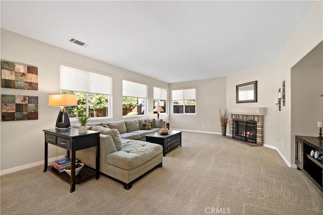 31484 Britton Cir, Temecula, CA 92591 - living room with baseboards, light carpet, and a fireplace