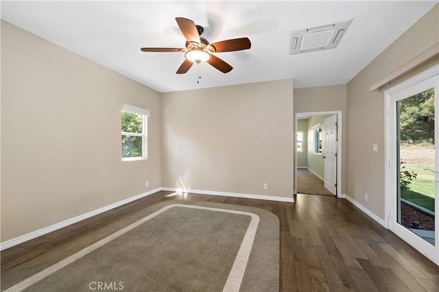 31484 Britton Cir, Temecula, CA 92591 - unfurnished room with ceiling fan, dark wood-type flooring, healthy amount of natural light, and baseboards