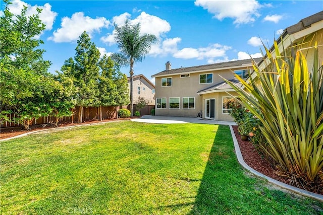 31484 Britton Cir, Temecula, CA 92591 - back of property with stucco siding and a patio area