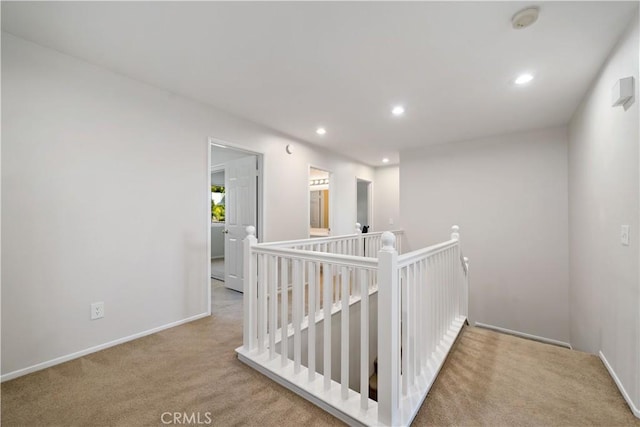31484 Britton Cir, Temecula, CA 92591 - hall featuring an upstairs landing, recessed lighting, carpet floors, and baseboards