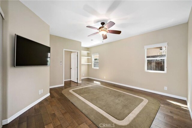 31484 Britton Cir, Temecula, CA 92591 - unfurnished living room with ceiling fan, baseboards, and dark wood finished floors