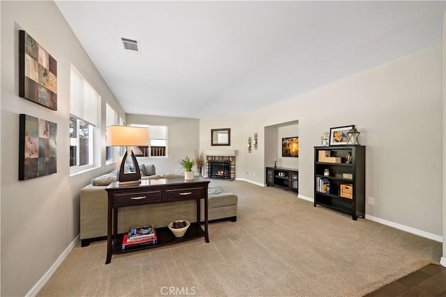 31484 Britton Cir, Temecula, CA 92591 - carpeted living area with baseboards and a fireplace