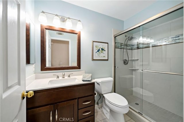 31484 Britton Cir, Temecula, CA 92591 - bathroom with toilet, a shower stall, vanity, and tile patterned flooring