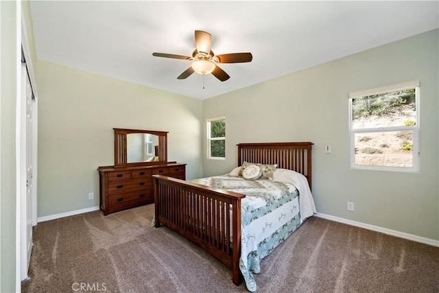 31484 Britton Cir, Temecula, CA 92591 - carpeted bedroom with multiple windows, baseboards, and a ceiling fan