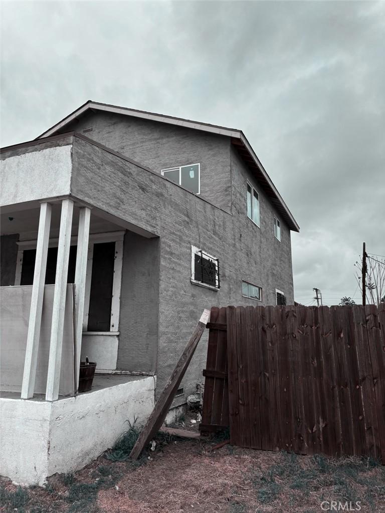 1825 E 109th Pl, Los Angeles, CA 90059 - view of property exterior with stucco siding