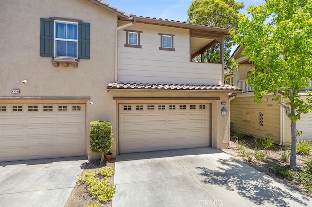3245 Moss Landing Blvd, Oxnard, CA 93036 - view of front of property featuring an attached garage, driveway, and stucco siding