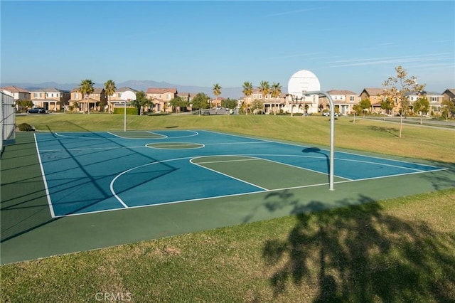 3245 Moss Landing Blvd, Oxnard, CA 93036 - view of basketball court with a residential view, a yard, community basketball court, and a mountain view