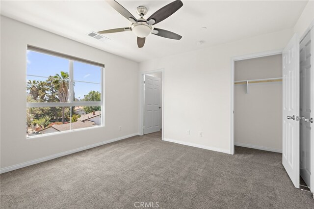 14856 Maple Ter, Panorama City, CA 91402 - unfurnished bedroom featuring carpet flooring, baseboards, a ceiling fan, and a closet