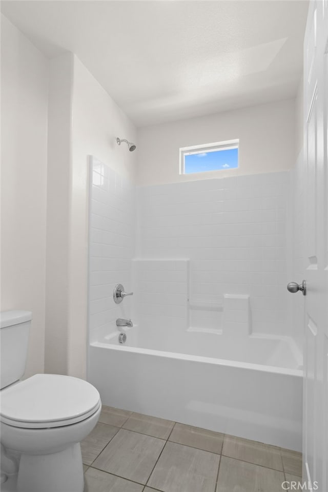 14856 Maple Ter, Panorama City, CA 91402 - bathroom with toilet, tub / shower combination, and tile patterned floors