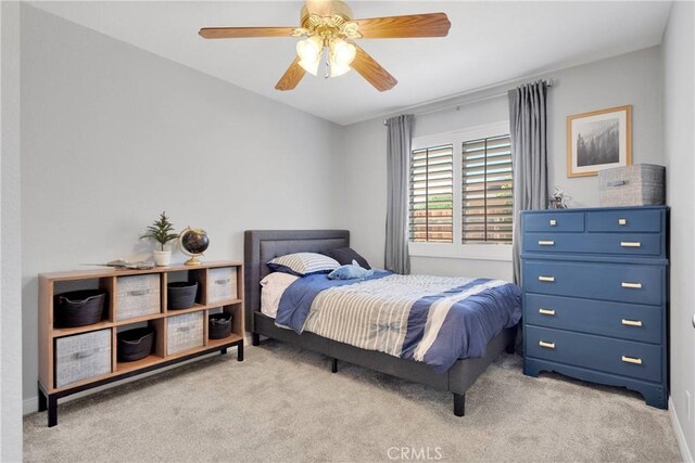 13950 High Falls Trl, Apple Valley, CA 92307 - bedroom with light colored carpet and a ceiling fan