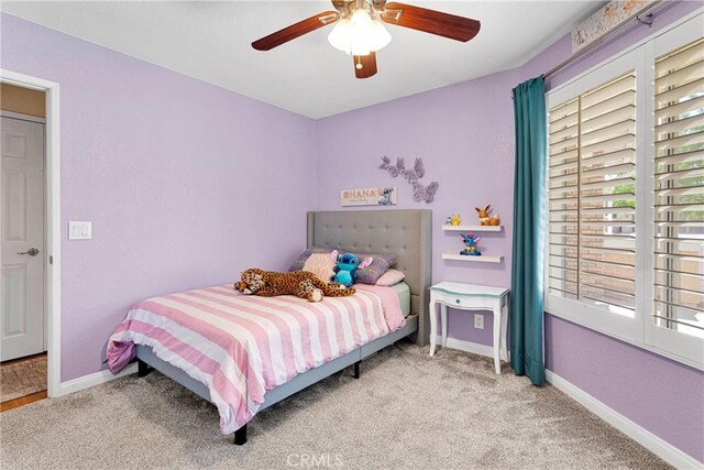 13950 High Falls Trl, Apple Valley, CA 92307 - carpeted bedroom featuring baseboards and a ceiling fan