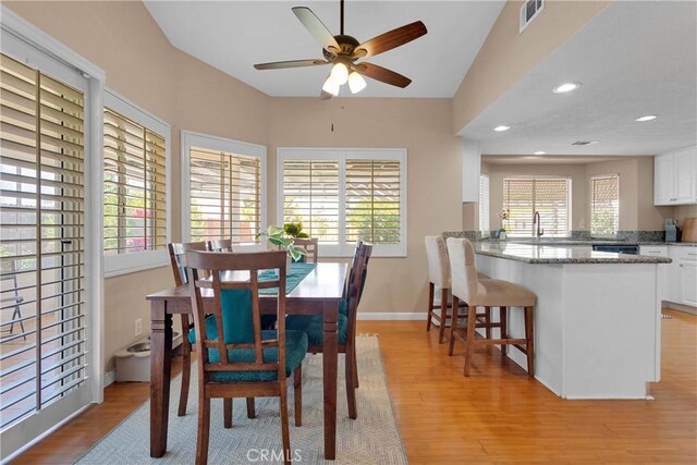 13950 High Falls Trl, Apple Valley, CA 92307 - dining area with light wood-style floors, ceiling fan, recessed lighting, and baseboards