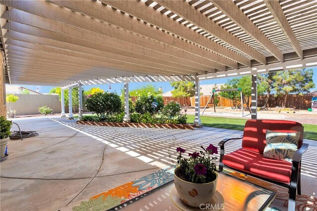 13950 High Falls Trl, Apple Valley, CA 92307 - fenced backyard with a playground, a pergola, and a patio