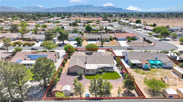 13950 High Falls Trl, Apple Valley, CA 92307 - aerial view of residential area with property boundaries highlighted and a mountainous background