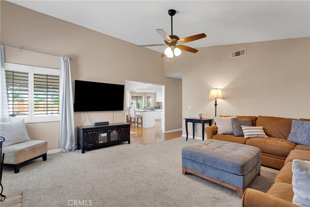13950 High Falls Trl, Apple Valley, CA 92307 - living room featuring baseboards, a ceiling fan, carpet flooring, and high vaulted ceiling