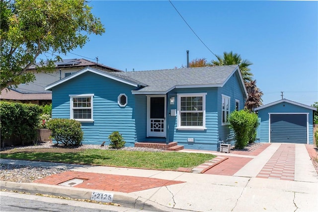2125 256th St, Lomita, CA 90717 - bungalow-style house featuring an outdoor structure, driveway, a detached garage, and roof with shingles