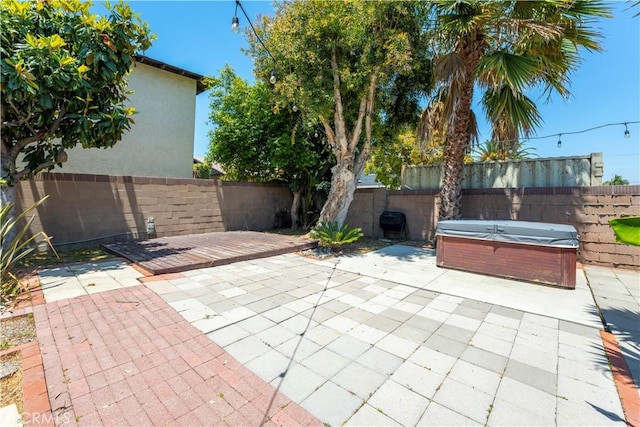 2125 256th St, Lomita, CA 90717 - fenced backyard featuring a hot tub and a patio area