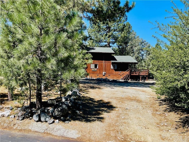 2521 Cedarwood Dr, Pine Mountain Club, CA 93222 - view of side of home featuring a wooden deck and crawl space