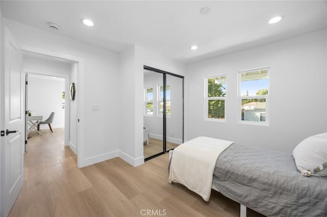 201 S Melrose St, Placentia, CA 92870 - bedroom featuring light wood-type flooring, recessed lighting, a closet, and baseboards