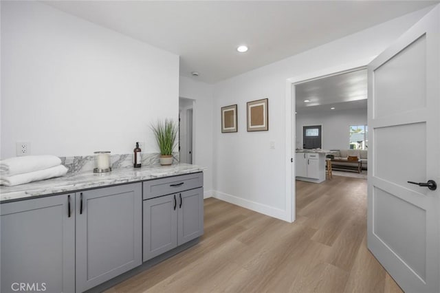 201 S Melrose St, Placentia, CA 92870 - bar featuring light wood-type flooring, baseboards, and recessed lighting