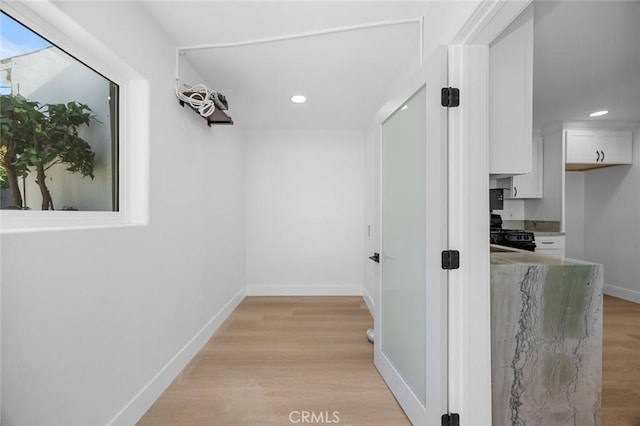 201 S Melrose St, Placentia, CA 92870 - hall with light wood-type flooring, recessed lighting, and baseboards