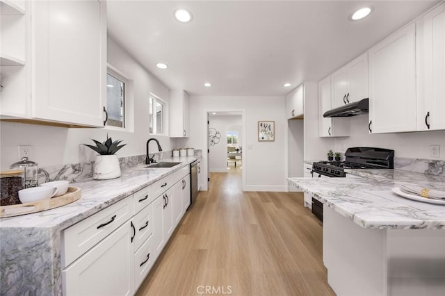 201 S Melrose St, Placentia, CA 92870 - kitchen with a sink, stainless steel dishwasher, under cabinet range hood, white cabinets, and light wood-style flooring