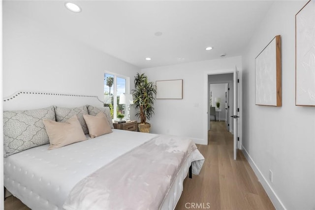201 S Melrose St, Placentia, CA 92870 - bedroom featuring recessed lighting, wood finished floors, and baseboards