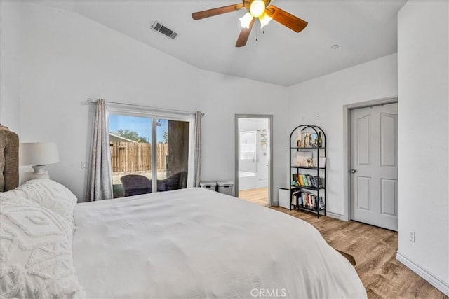 5947 Lupine Ave Unit 29, Palms, CA 92277 - bedroom with access to exterior, vaulted ceiling, light wood-style floors, connected bathroom, and a ceiling fan