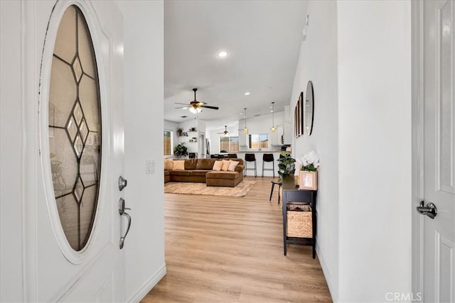 5947 Lupine Ave Unit 29, Palms, CA 92277 - foyer with a ceiling fan, light wood-style flooring, recessed lighting, and baseboards