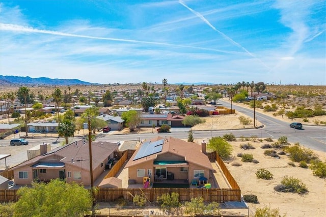 5947 Lupine Ave Unit 29, Palms, CA 92277 - aerial perspective of suburban area with a mountainous background