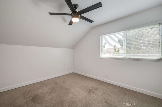 8072 Sundance Ln, La Palma, CA 90623 - additional living space featuring vaulted ceiling, baseboards, carpet, and ceiling fan
