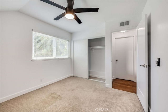 8072 Sundance Ln, La Palma, CA 90623 - unfurnished bedroom with light colored carpet, a closet, baseboards, and a ceiling fan