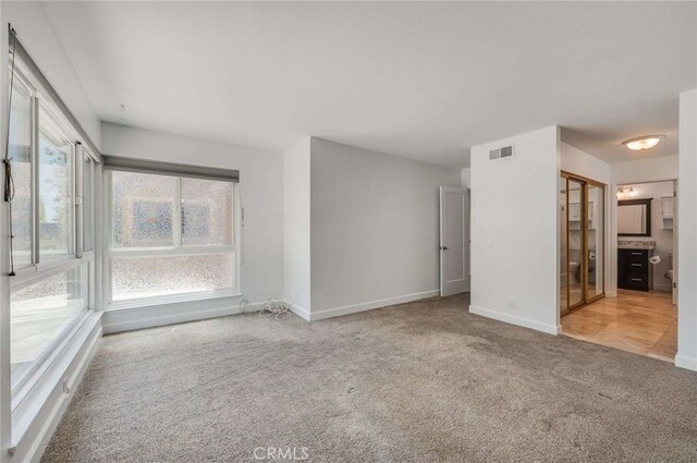 8072 Sundance Ln, La Palma, CA 90623 - empty room featuring carpet floors and baseboards