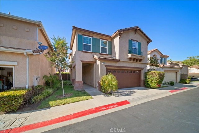 594 Yarrow Dr, Simi Valley, CA 93065 - view of property featuring a garage, stucco siding, and concrete driveway