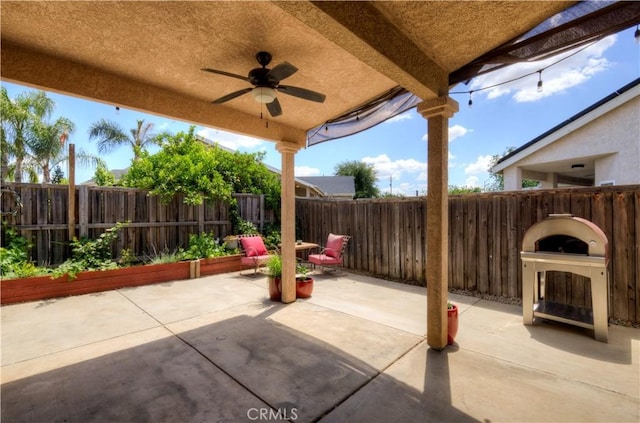 2267 Lorena Ave, Sanger, CA 93657 - fenced backyard featuring a patio and a ceiling fan
