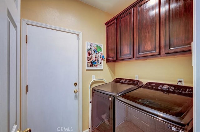 2267 Lorena Ave, Sanger, CA 93657 - laundry room featuring independent washer and dryer and cabinet space