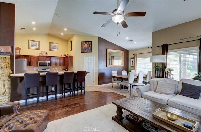 2267 Lorena Ave, Sanger, CA 93657 - living area featuring lofted ceiling, ceiling fan, dark wood-type flooring, baseboards, and recessed lighting