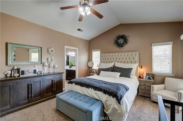2267 Lorena Ave, Sanger, CA 93657 - bedroom featuring light colored carpet, lofted ceiling, multiple windows, ensuite bathroom, and a ceiling fan