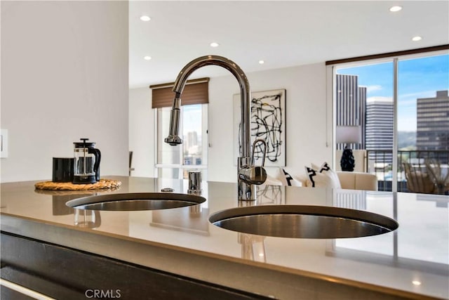 2160 Century Park E Unit 1512, Los Angeles, CA 90067 - kitchen with healthy amount of natural light, recessed lighting, and a sink