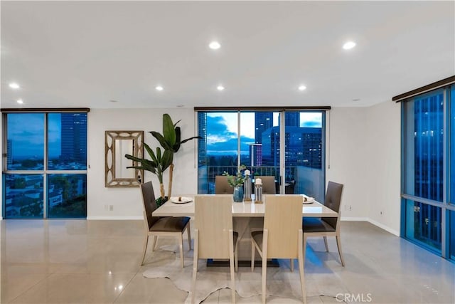 2160 Century Park E Unit 1512, Los Angeles, CA 90067 - dining area with recessed lighting, baseboards, and a wall of windows