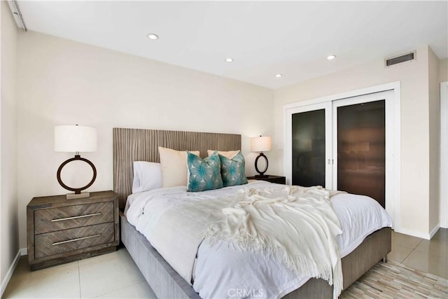 2160 Century Park E Unit 1512, Los Angeles, CA 90067 - bedroom featuring baseboards, light tile patterned flooring, and recessed lighting