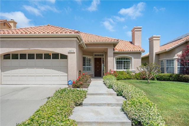 28291 La Plumosa, Laguna Niguel, CA 92667 - mediterranean / spanish-style home featuring a tile roof, driveway, a front lawn, a chimney, and an attached garage