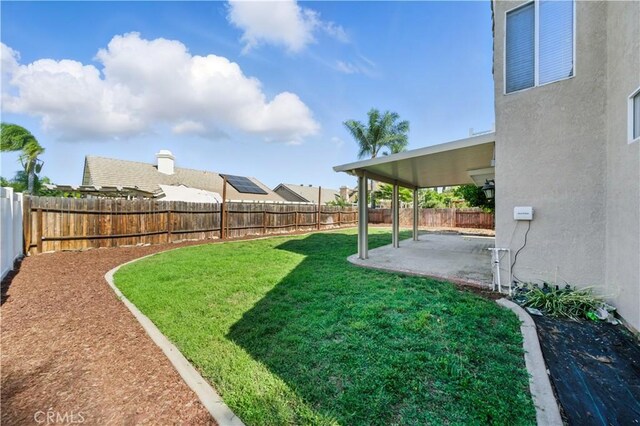 31070 Larchwood St, Menifee, CA 92584 - fenced backyard featuring a patio area